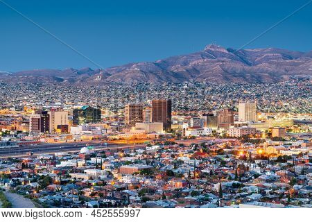 El Paso, Texas, USA  downtown city skyline at dusk with Juarez, Mexico in the distance.