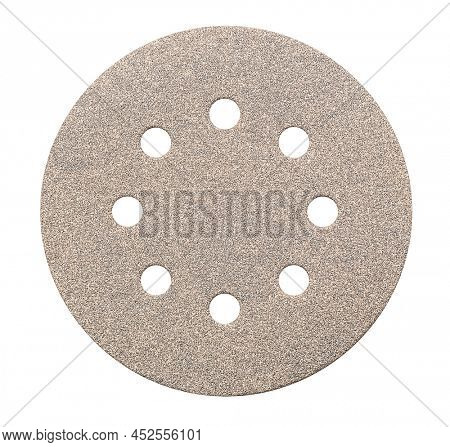Round sandpaper disc isolated on a white background, including clipping path. Sanding disk for random orbital sander