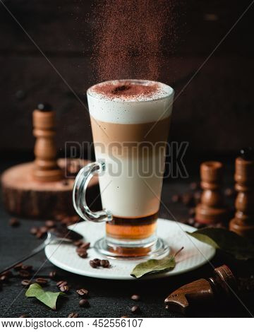 Caramel Latte With Chocolade On The Table