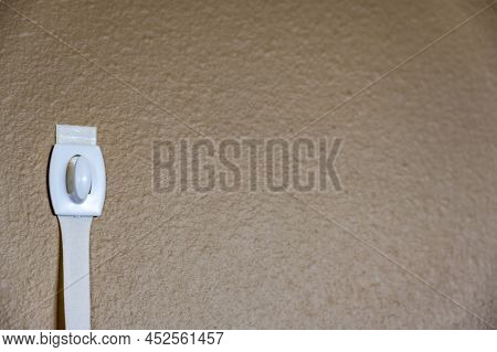 Selective Focus On Adhesive Strip Wall Hanger That Can Be Removed By Pulling Tape