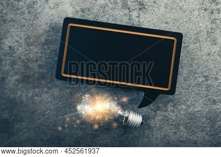 Glowing Light Bub With Black Speech With Copy Space. Concept Of Success Idea Or Creativity.