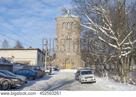 Priozersk, Russia - February 08, 2021: Old Lutheran Church In The Cityscape On A Sunny February Day