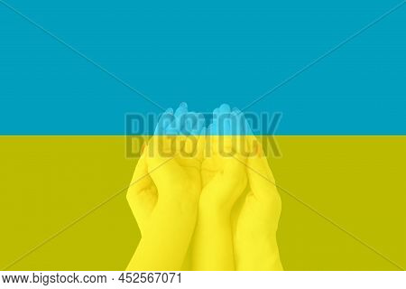 Flag Ukraine With Woman Praying And Worshiping Hands In Worship To God On Flag Background, Folded Ha