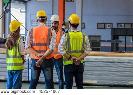 Team Foreman Or Team Worker Work At Factory Site Check Up Machine Or Products In Site. Team Engineer