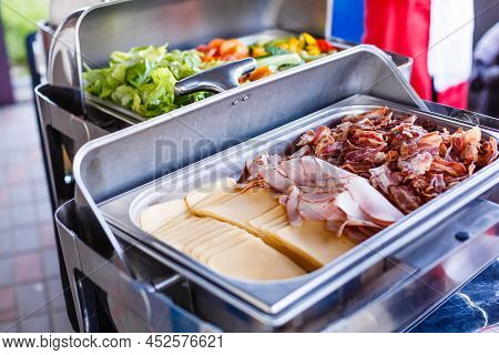 Slices Of Emmental Cheese And Italian Baked Ham
