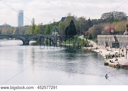 Torino, Italy - April 8 2022: Beautiful Aerial View Of Po River In Torino, Italy With Buildings, Sky