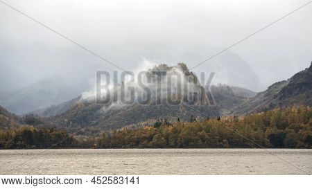 Beautiful Landscape Image Of Caste Crag Shrouded In Mist During Autumn View Along Derwentwater In La