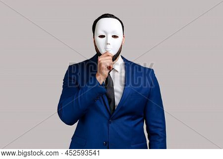 Anonymous Unknown Businessman Covering Her Face With White Mask, Hiding Her Real Personality, Anonym