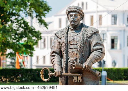 Minsk, Belarus - July 1, 2021: Statue Of The Mayor With The Key And A Royal Charter In The Hands Sym