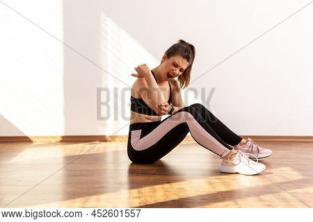 Girl Touches Painful Elbow, Suffers Ulnar Joint Injury During Training, Sport Trauma, Inflamed Nerve