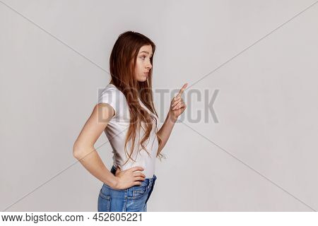 Hey You, Be Careful. Side View Of Portrait Of Strict Bossy Woman Seriously Pointing Finger And Looki