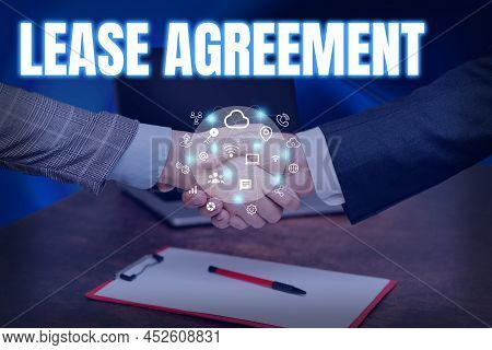 Text Sign Showing Lease Agreement. Conceptual Photo Contract On The Terms To One Party Agrees Rent P