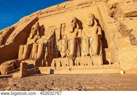 Statue In Front Of The Great Temple Of Ramses Ii In The Village Of Abu Simbel, Aswan, Upper Egypt