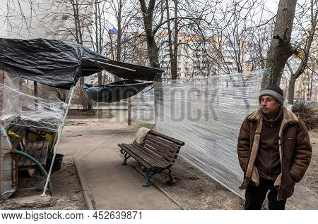 Bucha, Ukraine - Apr. 06, 2022: Local Residents Of Bucha From Apartments And Houses Destroyed By The