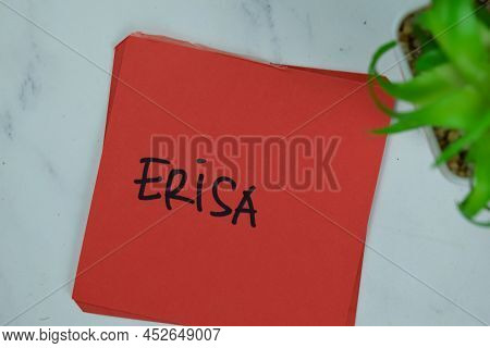 Erisa Write On Sticky Notes Isolated On Wooden Table.