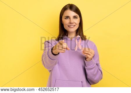 Smiling Woman Holding Pink Ribbon Near Her Chest Supporting Another Women, International Symbol Of B