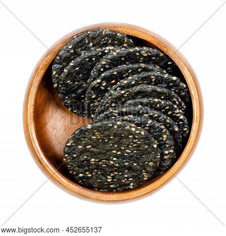 Senbei, Japanese Sesame Crackers, In A Wooden Bowl. Crispy Macrobiotic Crackers, Made Of Brown Rice,