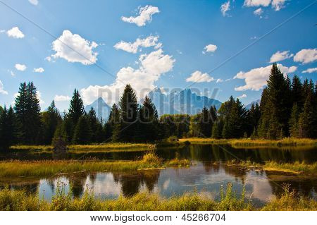 สะท้อน Teton สวยงามในอุทยานแห่งชาติแก Teton