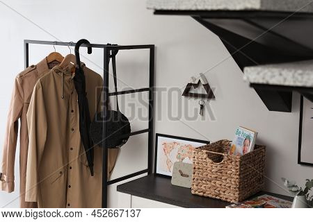 Modern Hallway Interior With Stylish Furniture And Key Holder