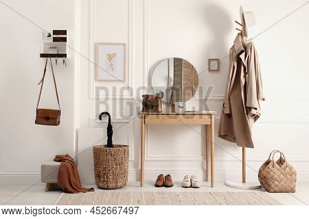 Modern Hallway Interior With Stylish Dressing Table And Key Holder