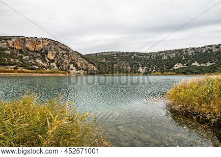 Landscape Of Karstic Cliffs In Large Lagoon Of Tobar In Beteta, Cuenca, Landscapes Of The Mountain R