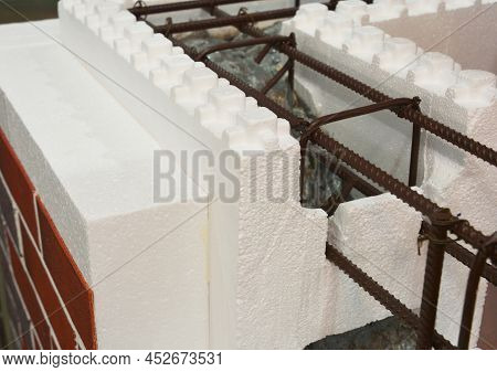 A Close-up Of An Insulated Concrete Form (icf) Wall With An Expanded Polystyrene Insulation, Steel R