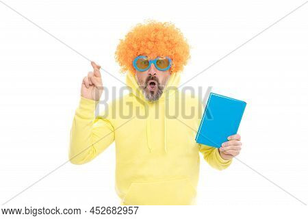 Superstitious Idea. Superstitious Man Hold Book. Keeping Fingers Crossed For Luck
