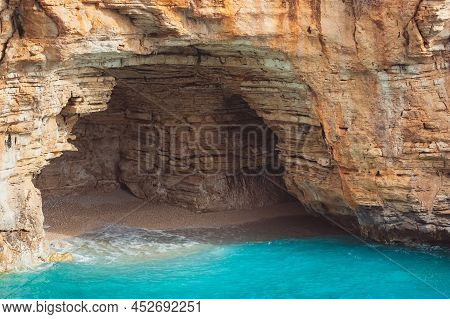 A Close View Of The Cove With Cave On The Demre - Finike Road. Antalya, Turkey