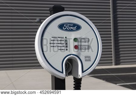Kokomo - Circa April 2022: Ford Electric Charging Station For The Mustang Mach-e, Fusion Plug-in And