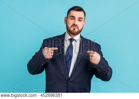This Is Me. Portrait Of Egoistic Arrogant Selfish Man With Beard Wearing Official Style Suit Pointin