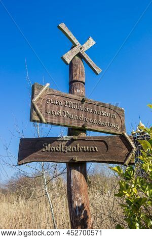 Tourist Sign For The City Center And Windmill Museum In Gifhorn, Germany