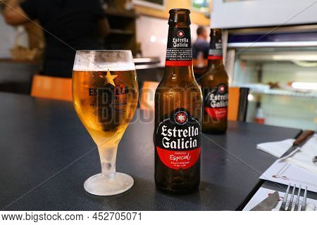 Barcelona, Spain - October 7, 2021: Estrella Galicia Bottled Beer In Barcelona, Spain. It Is A Pale 