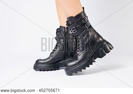 Legs Of A Woman In Black Leather Boots From A New Collection On A White Background, Legs Of A Girl I