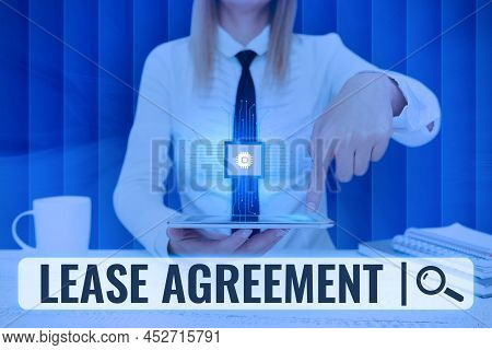 Handwriting Text Lease Agreement. Concept Meaning Contract On The Terms To One Party Agrees Rent Pro