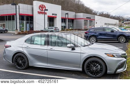 Monroeville, Pennsylvania, Usa April 10, 2022 A New Silver Toyota Sedan For Sale At A Dealership On 