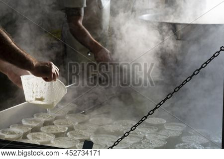 Process Of Making Fresh White Soft Ricotta Whey Cheese On Small Cheese Farm In Parma, Italy