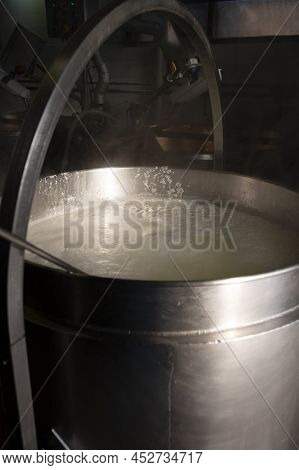 Process Of Making Fresh White Soft Ricotta Whey Cheese On Small Cheese Farm In Parma, Italy