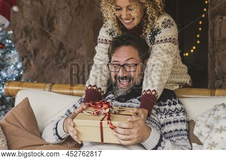 Christmas Eve Holidays Gif Exchange Activity With Man And Woman At Home. Female Give Present At Adul