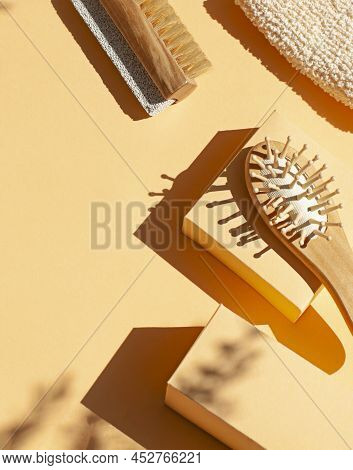 Bathroom Wellness Spa Accessories Concept Flat Lay On The Beige Background. Top View Frame With Hair