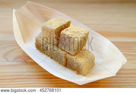 Warabimochi, A Soft And Chewy Japanese Confection Dipped In Roasted Soy Flour Called Kinako