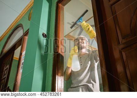 Muslim Young Male Cleaning The Mosque Before Praying