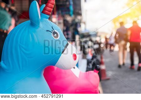 Close-up Of A Generic Plastic Toy Offered By A Retailer In A Traditional Market In Boaco, Nicaragua