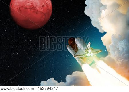 Rocket With Blast And Smoke Takes Off To The Red Planet Mars. Spacecraft Lift Off To Explore Other P