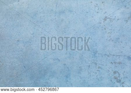 Light Blue Concrete Wall With Splattered Paint Spots For Backdrop. Abstract Pattern.