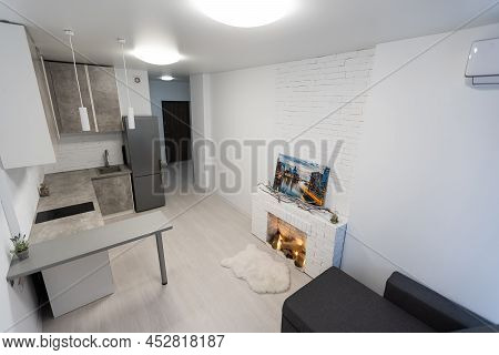 Modern Studio Flat With Small Kitchen, Sofa.