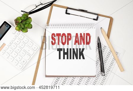 Office Desk Table With Paper Sheet, Notepad ,chart And Calculator. Top View, Stop And Think
