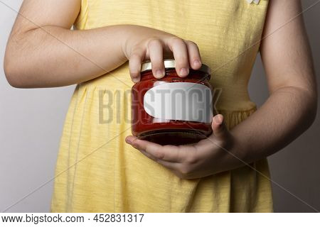 Little Girl Opening A Tomato Paste Jar Cap By Hands, Editable Mock-up Series Emplate Ready For Your 