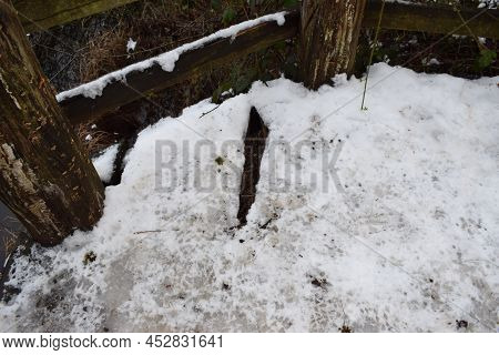 Snow On A Wooden Platform In Holzmaar