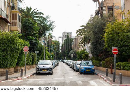 A Large Number Of Cars Are Parked On Both Sides Of The Street. Tel Aviv, Israel - 02.14.2015