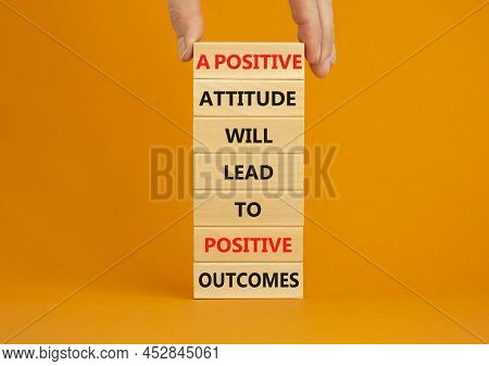 Think Positive Symbol. Wood Blocks With Words A Positive Attitude Will Come To Positive Outcomes. Or